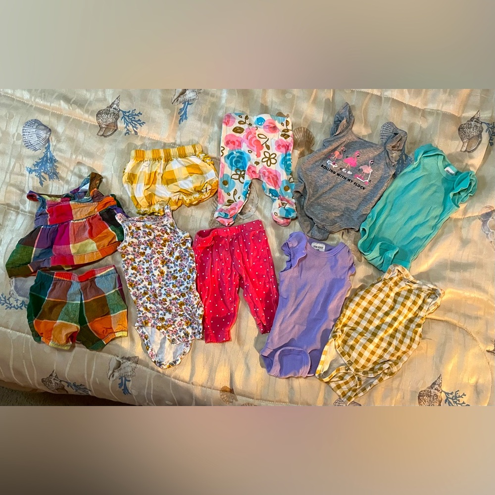 Bundle of Ten Pieces of Newborn Size Clothing Items